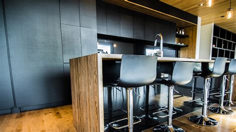 The company continues to manufacture highest quality cabinetry using professional engineering. Black Ash Wood Kitchen Cabinets | Ateliers Jacob Calgary