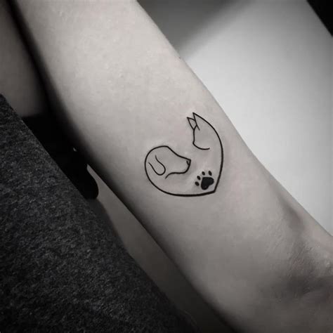 27 Best Cat And Dog Tattoo Designs The Paws Cat And Dog Tattoo