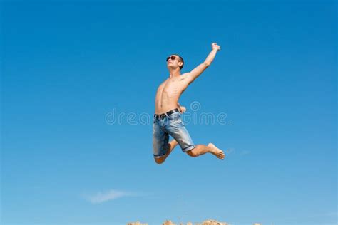 Young Man Jumping Stock Image Image Of Cloudy Carefree 30549269