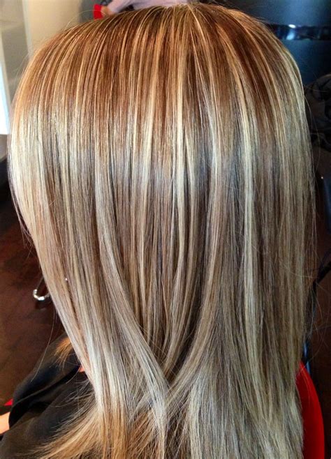 This beautiful hair color was created by foiling the top of head in a