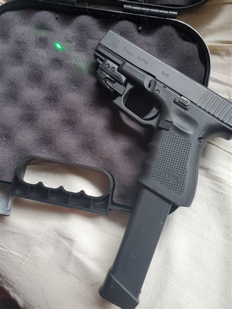 My Glock 19 Gen 4 W Crimson Trace Green Laser And 33 Round Extended