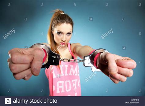 Teenager In Handcuffs Stock Photos & Teenager In Handcuffs Stock Images - Alamy