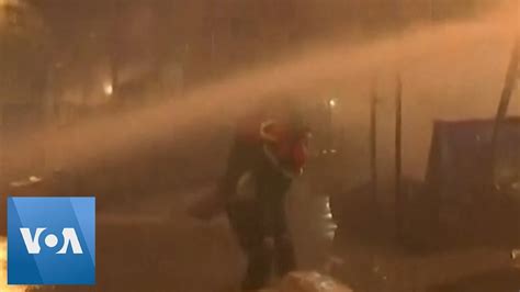 Tear Gas Water Cannons Fired At Lebanese Protesters YouTube