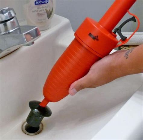 this air pressure gun drain blaster instantly unclogs sinks tubs and toilets