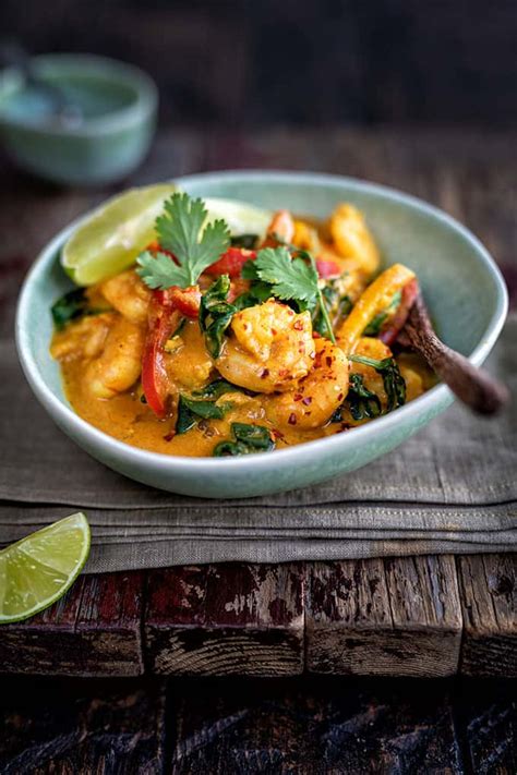 Thai red curry paste has typical ingredients like lemongrass, galangal, shrimp paste, shallots, cilantro root,red chilies and spices like coriander, cumin, fennel black pepper seeds turmeric root. Quick and Easy Prawn Curry - Supergolden Bakes