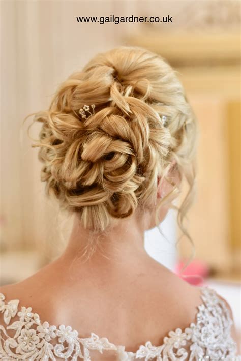 It is a worthwhile option to wear curly hair for the wedding. Romantic Updo | Romantic hairstyles, Wedding hair and ...