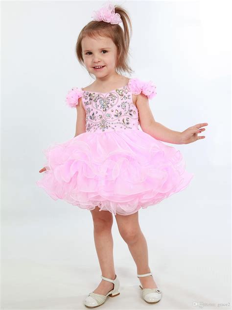 Pink Girls Pageant Dresses 2017 With Flower Sleeves And Tiered Skirt