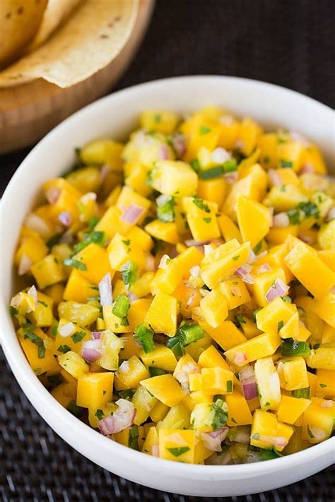 This easy, homemade salsa is perfect for salmon, fish tacos, chicken, and of course, dipping with chips! Mango Salsa Recipe