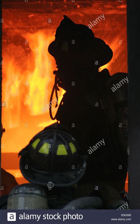 Firefighters Putting Out Fire In Hi Res Stock Photography And Images