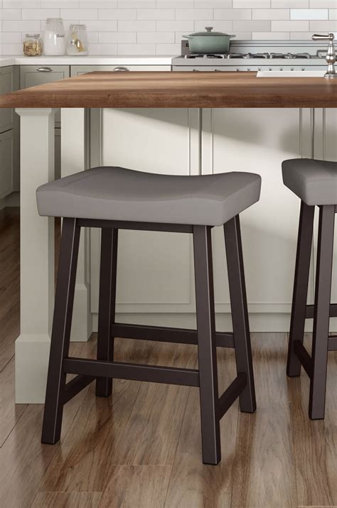 H) $79.00 $67.15 stylewell upholstered counter stool with brown faux leather saddle seat (set of 2) (18.75 in. Buy Amisco's Miller Farmhouse Backless Saddle Stool • Free ...