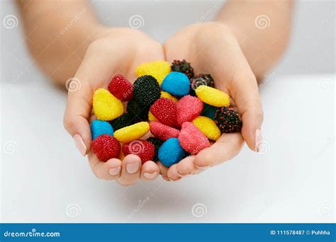 Sweets Close Up Of Colorful Candies In Hands Stock Image Image Of