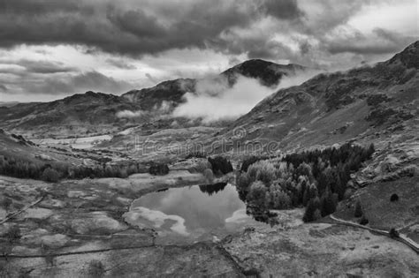 Stunning Flying Drone Black And White Landscape Image Of Langdale Pikes