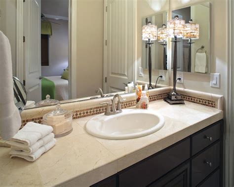 In particular, this countertop option works well if your bathroom is on the small side—that's because the one major downside of ceramic tile bathroom countertops is cleaning the grout between tiles. Tile Countertop Bathroom Ideas, Pictures, Remodel and Decor