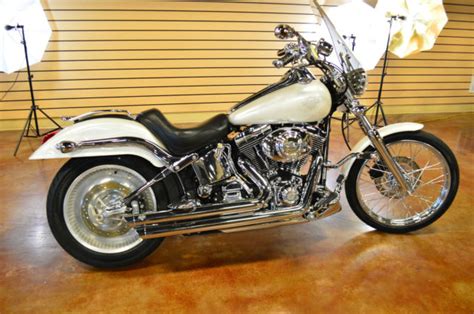 The standard also gets a raked fx fork, laced wheels, horseshoe oil tank and fat rear tire with bobtail. 2003 Harley Davidson Softail Deuce FXSTD 100th Anniversary ...