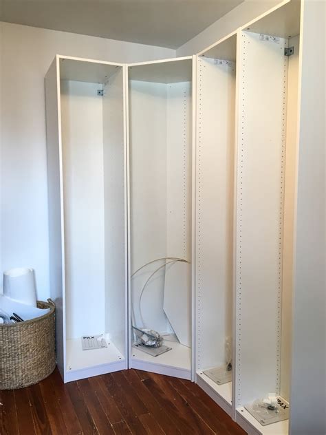 Custom drawer fronts, paint and trim make this hack look like it was handmade for the space. DIY Project: Pax Wardrobe Hack | andchristina