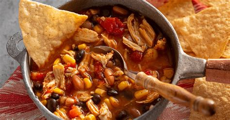 · simmer trisha yearwood's chicken tortilla soup recipe, from trisha's southern kitchen on food network, with a jar of salsa, fajita seasoning and canned veggies. Trisha Yearwood Chicken Tortilla Soup - Insanely Good