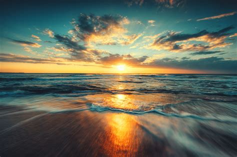 Beautiful Cloudscape Over The Sea Sunrise Shot Stock Photo Download