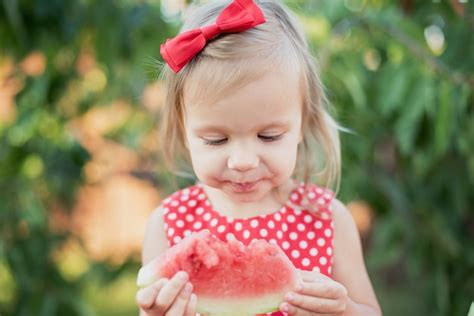 Premium Photo Cute Girl Eat Ripe Juicy Watermelon On Grass At Summertime