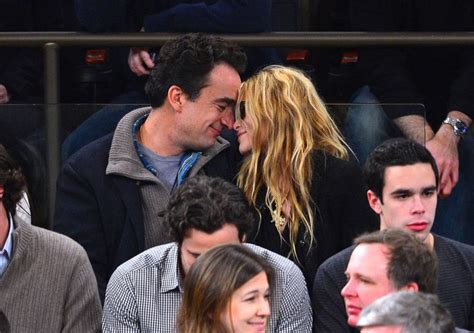 Olsen seemingly confirmed that in a rare interview. Mary-Kate Olsen, Olivier Sarkozy Hold Hands In Paris (PHOTO) | HuffPost