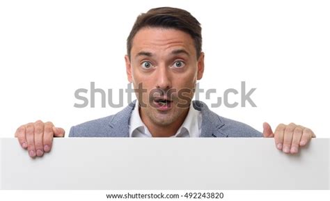 Shocked Guy Holding Blank Billboard Isolated Stock Photo 492243820