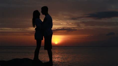 couple silhouette at the beach sunset light stock footage video 3599837 shutterstock