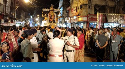 Lady Police Commander Standing On A Group During Hindu Religious