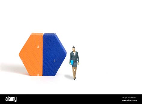 Miniature people toy figure photography. A businesswoman doing business