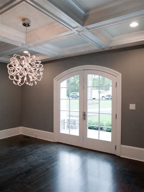 Light gray is this decade's trendiest neutral. dark floors, gray walls, white trim. In love | Home, Grey ...