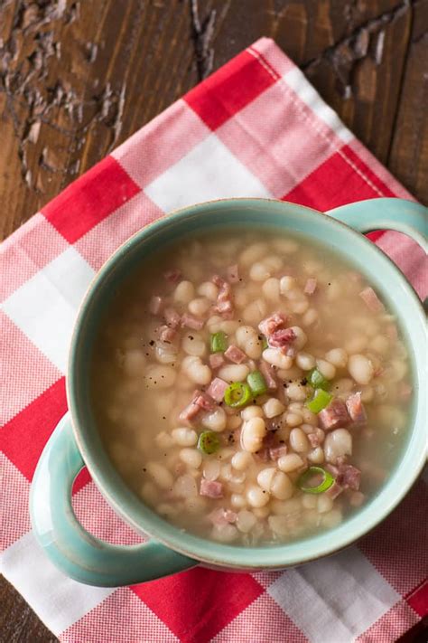 Navy bean and ham soup that recipe garlic, olive oil, ham bone, water, dried navy beans, onion triple pork and navy bean stew pork dried thyme, ham, pepper, onion, carrots, salt, bay leaf, dijon and 8 more Navy Bean Soup and Ham