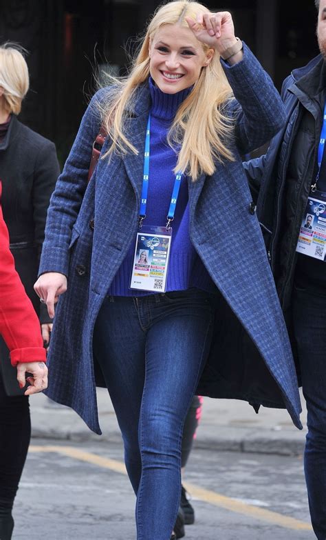 After moving to milan with her mother. MICHELLE HUNZIKER Arrives at Ariston Theater in Sanremo 01 ...