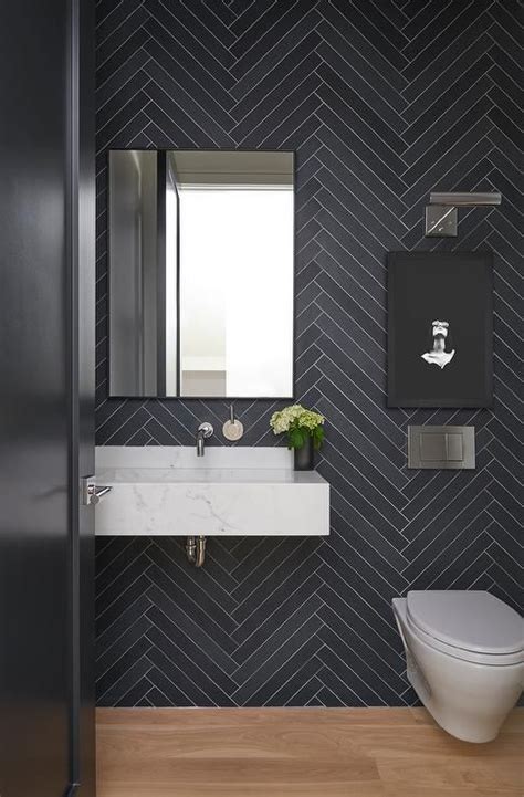 Chic Contemporary Powder Room Features A Wall Covered In Black