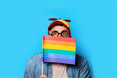 Nerd Man With Noob Hat Holding A Rainbow Flag Stock Photo Download