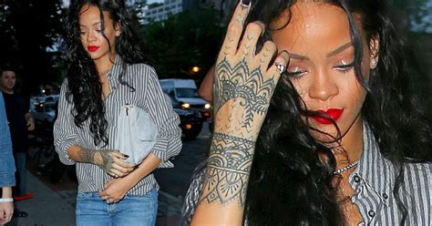 Has Rihanna Tattooed Entire Lower Arm Star Spotted With Body Art