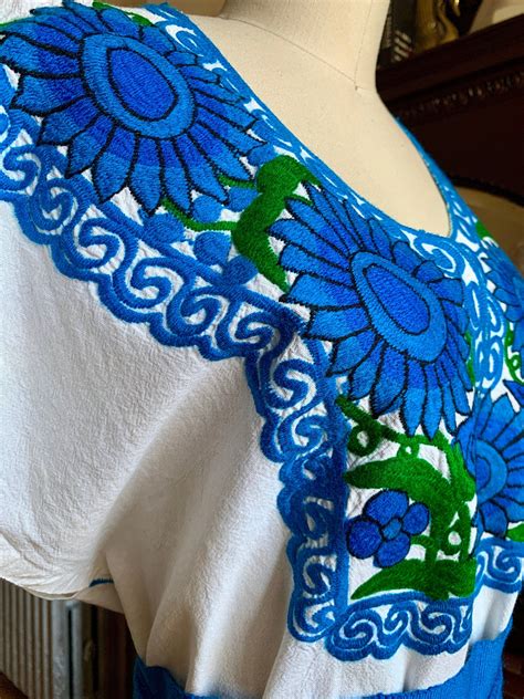 vibrant blue and green floral embroidered authentic handmade mexican cotton dress comes with a