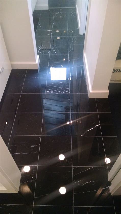 And looking to the left: Polished Black Marble Master Bathroom Flooring ...
