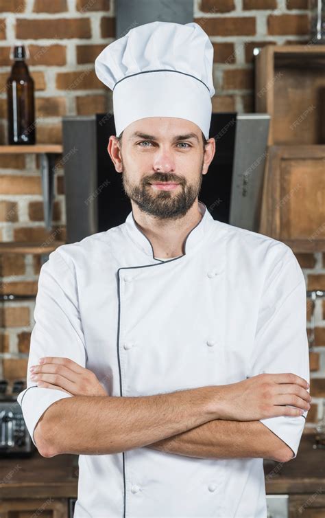 Free Photo Portrait Of Confident Male Chef In The Kitchen