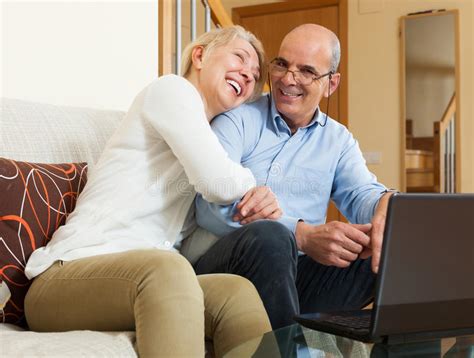Happy Mature Couple With Laptop Stock Image Image Of Couple Senior