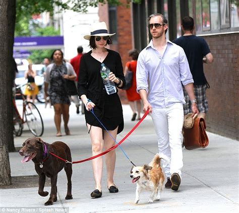 Anne Hathaway And Husband Adam Shulman Walk Their Dogs In Nycs East