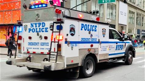 Nypd Esu Truck Responding On 6th Avenue In The Midtown Area Of