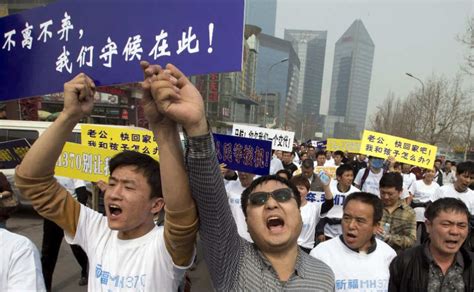 Shanghai Residents Stage Protest In China Against Property Law Rare