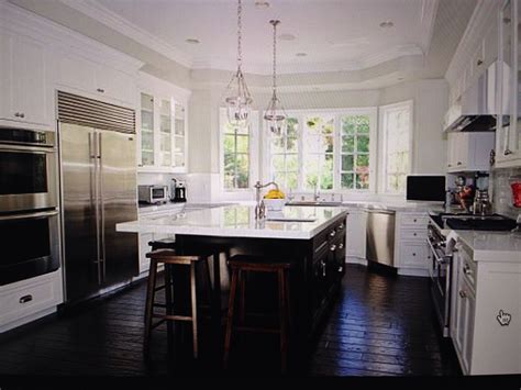 Kitchen Dark Wood Look Floors White Cabinets And Slate Appliances