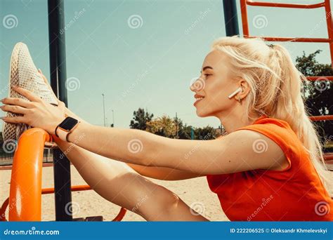 Beautiful Blonde Doing Stretching On The Playground Stock Image Image