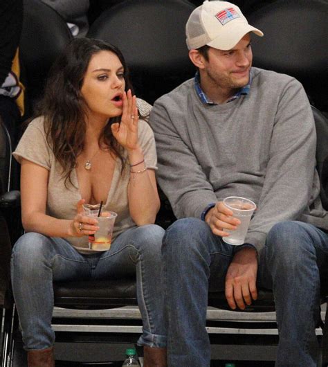 mila kunis and ashton kutcher show the passion is still alive at lakers game mirror online