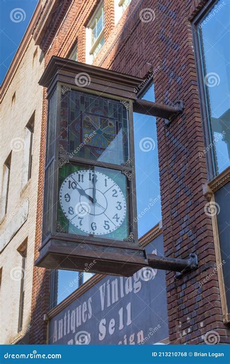 View Of Decorative Wall Clock Hanging From A Shop On North Street