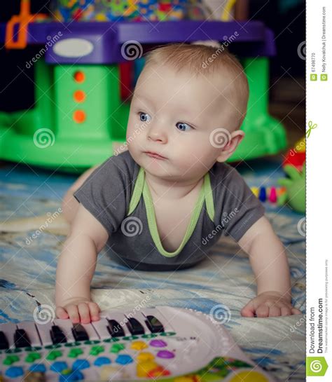 Baby Boy Playing With Piano Toy Stock Photo Image Of
