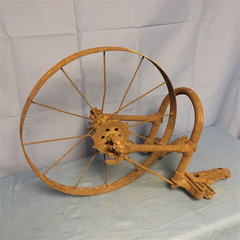 Antique Iron Age Steel Spoke Wheel Farm Corn Seeder Cultivator