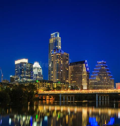 Austin Downtown Skyline By The River At Night Texas Stock Photo