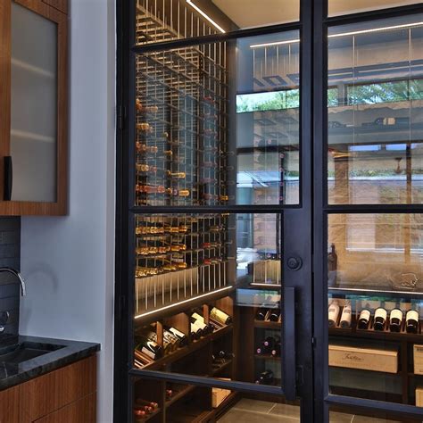 Glass Enclosed Wine Cellars Provide A Clean Modern Aesthetic With The