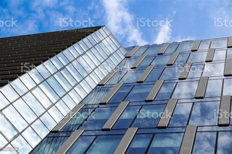 Modern Blue Glass Wall Of Office Building Stock Photo Download Image