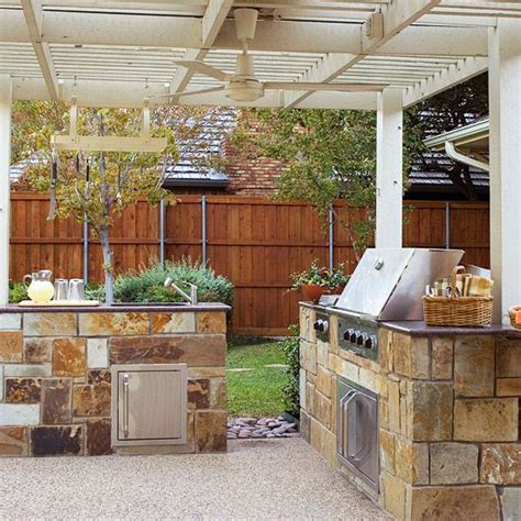 An outdoor kitchen will make your home the life of the party. Love This - Ceiling Fan, Pea Gravel, Kitchen, Arbor... | Outdoor kitchen design, Outdoor kitchen ...